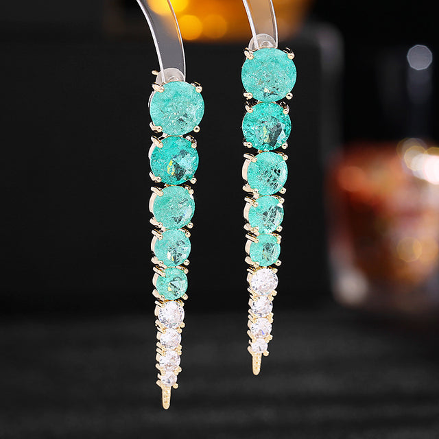 Aretes colgantes dorados