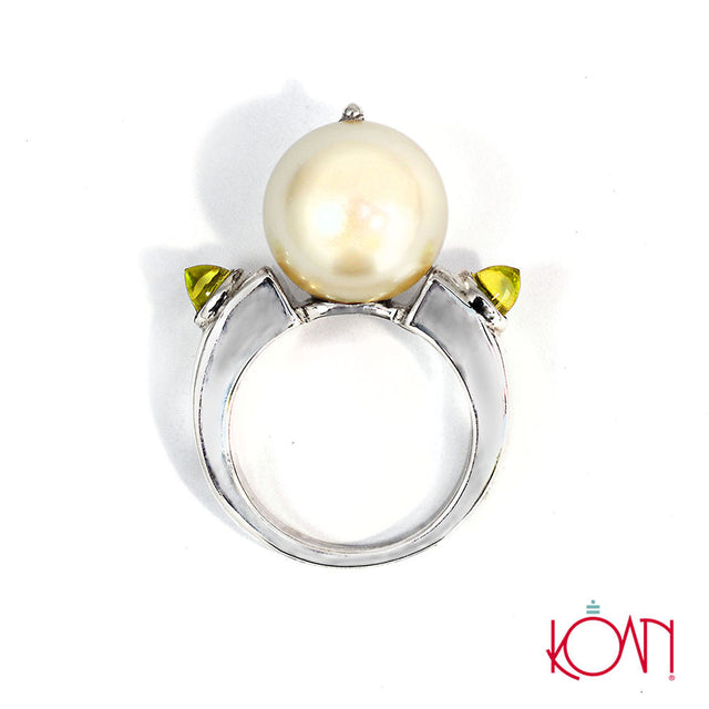 Anillo de plata con peridotos