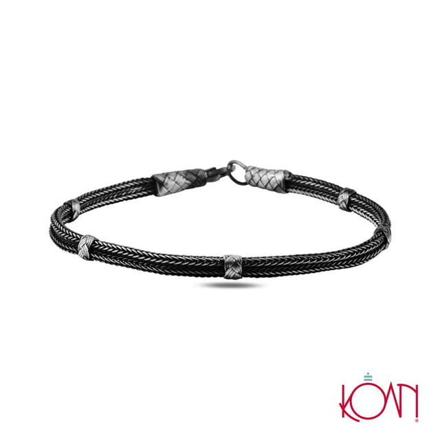Pulsera tejida de plata
