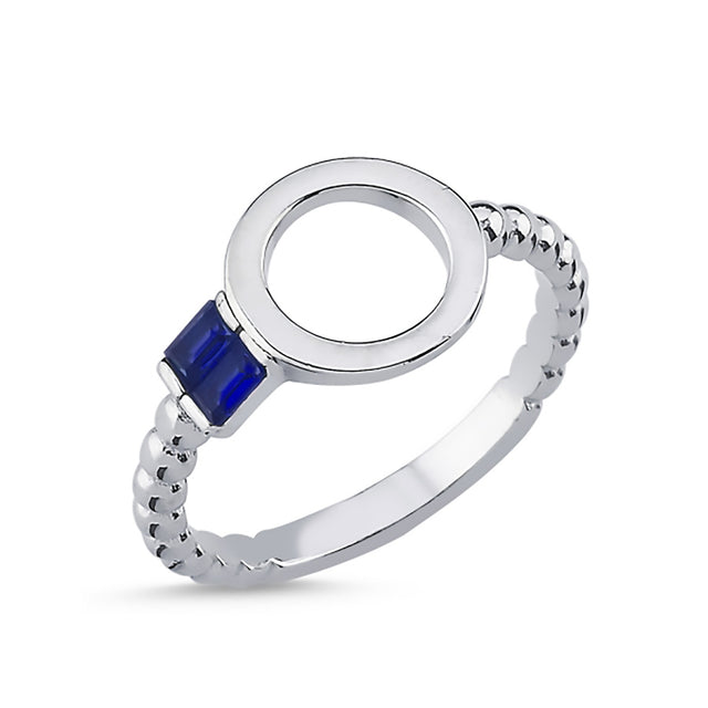 Anillo con circonias azules y círculo