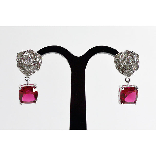 Aretes florales con circonias magentas