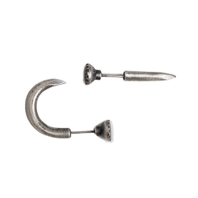 Aretes asimétricos de clavo