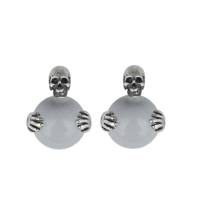 Aretes de calavera con ojo de gato