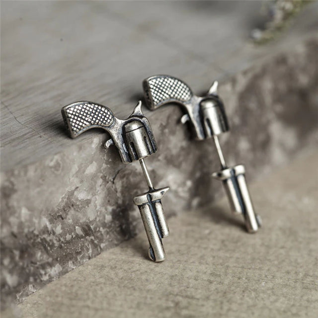 Aretes de pistola