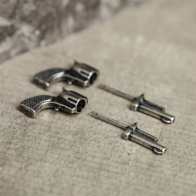 Aretes de pistola