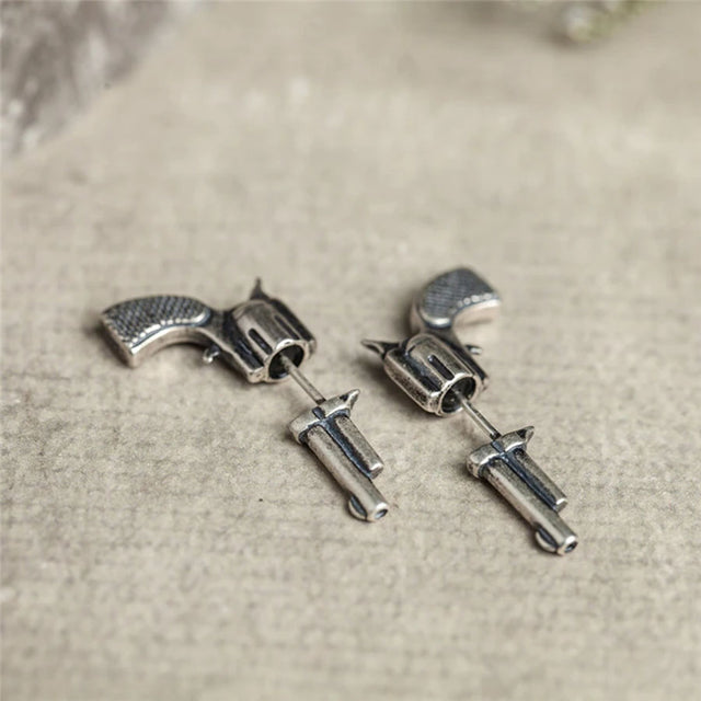 Aretes de pistola